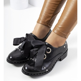 Chaussures plates noires de Belcastro 1