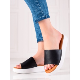 Encor Des pantoufles noires sur la plate-forme 1