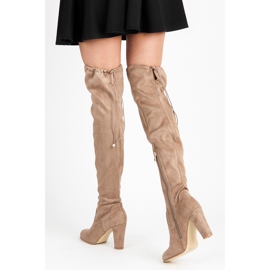 Betler Bottes en daim sur le poteau brun 1