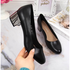 Escarpins sur un bloc d'argent noir Sergio Leone le noir 1