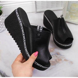 Pantoufles en cuir pour femmes sur un talon compensé Artiker noir le noir 2
