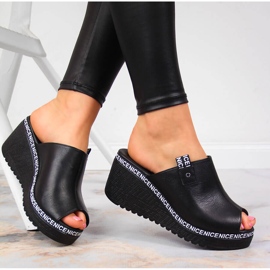 Pantoufles en cuir pour femmes sur un talon compensé Artiker noir le noir 5