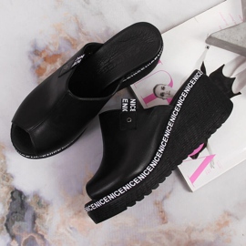 Pantoufles en cuir pour femmes sur un talon compensé Artiker noir le noir 4
