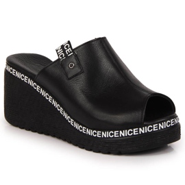 Pantoufles en cuir pour femmes sur un talon compensé Artiker noir le noir 1