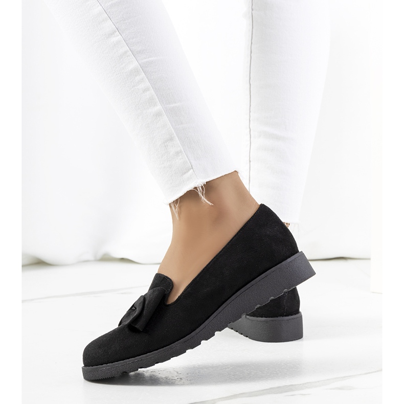 Chaussures noires sur le coin Poolse 1