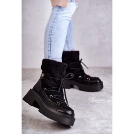Bottes de neige femme noires Sanna avec peau de mouton 1