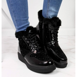 Bottes en cuir isolées en cuir noir Rieker 93312-00 sur la plate-forme le noir 10
