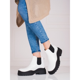 Bottines Chelsea noires et blanches pour femmes sur la plateforme 1