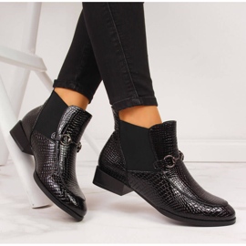 Bottines en cuir verni noir filippo peau de serpent 1