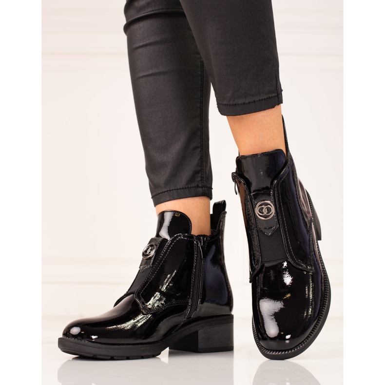 Bottines en cuir verni à talon plat pour femme noir 1