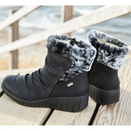 Bottes d'hiver imperméables noires Rieker Y1361-00 pour femmes blanche 1 Bottes d'hiver imperméables noires Rieker Y1361-00 pour femmes blanche 1