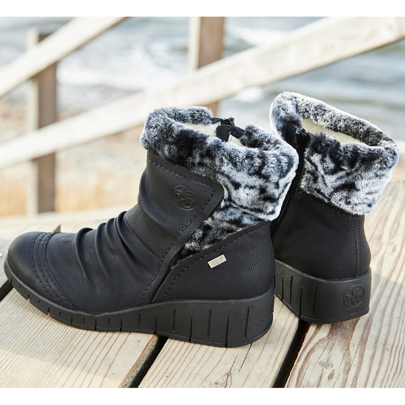 Bottes d'hiver imperméables noires Rieker Y1361-00 pour femmes blanche 1