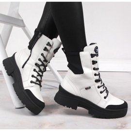 Bottes en cuir imperméables blanches pour femmes Rieker Revolution W0374-80 le noir 1