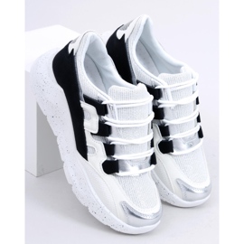 2009 Chaussures de sport pour femmes en noir et blanc blanche le noir 1