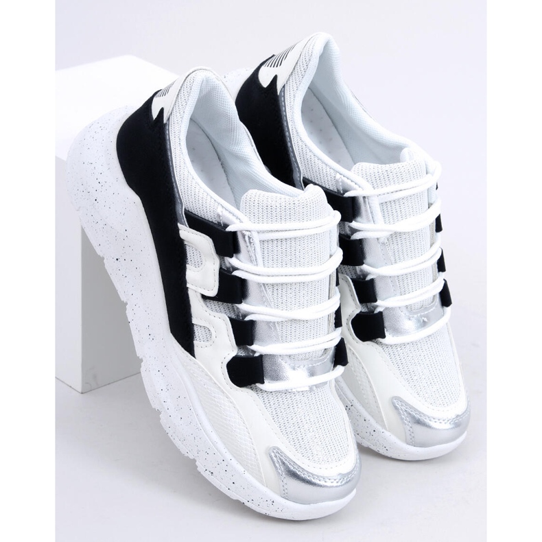 2009 Chaussures de sport pour femmes en noir et blanc blanche le noir 1