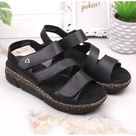 Sandales confortables pour femmes sur une plate-forme velcro noire Rieker V2301-00 2